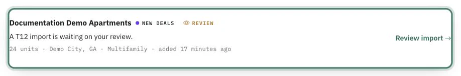A row in the dashboard's Needs Attention list: the deal name with New Deals and Review badges, the reason "A T12 import is waiting on your review", the deal's size, location and age, and a Review import action link.